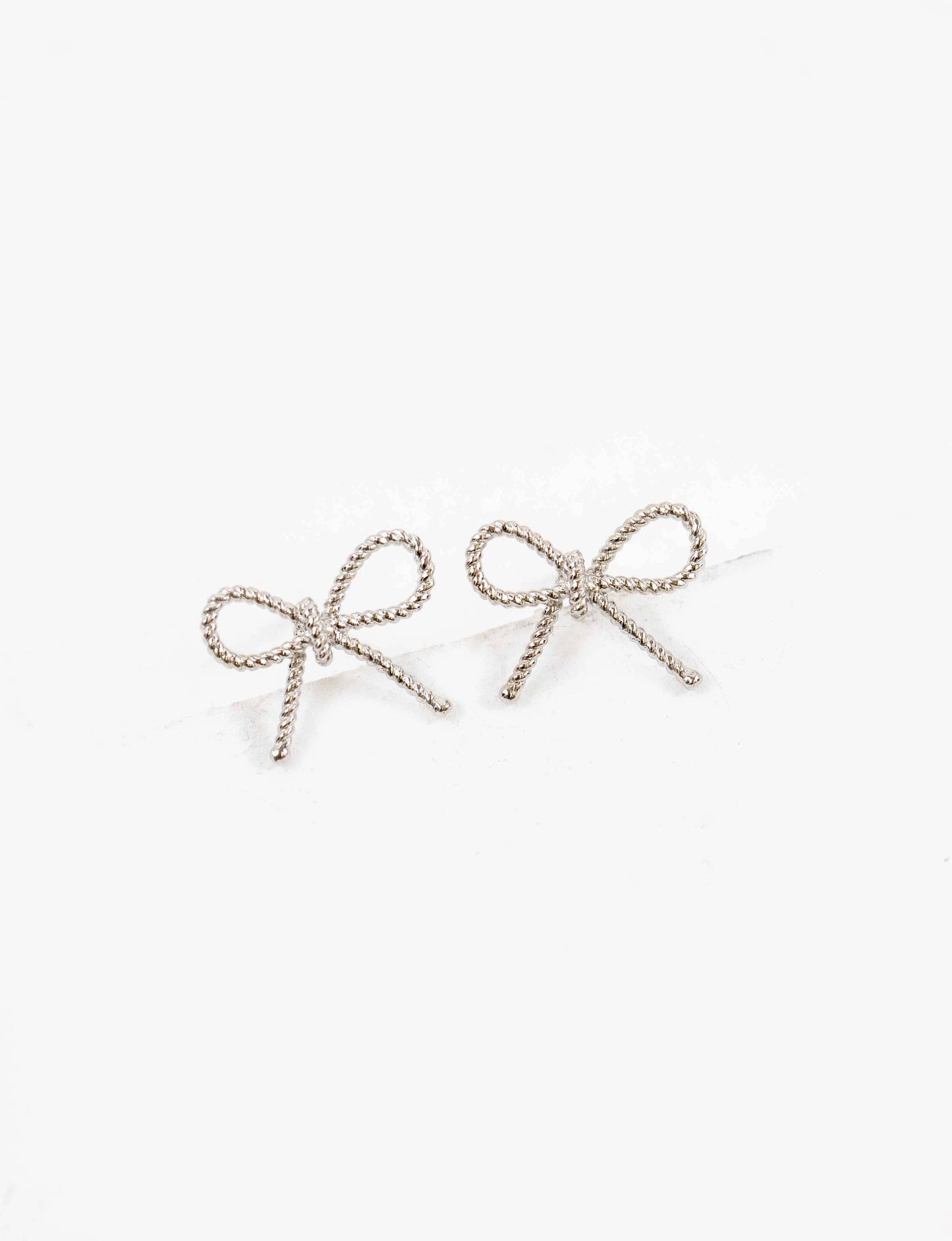 Ribbed Bow Charm Earrings | Silver